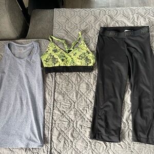Women’s workout lot.UA tank size xs,pink sports bra size small,Nike capris siz m
